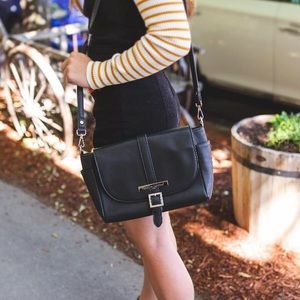 Damsel in defense purse